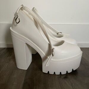 White platform heels.